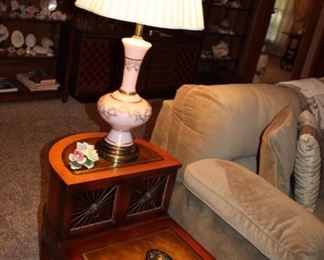Pair in excellent condition, leather tops, two side tables. note the storage doors, medal. 