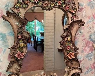 Three piece porcelain wall mirror measuring 41 x 33..... Picture 1 of 2