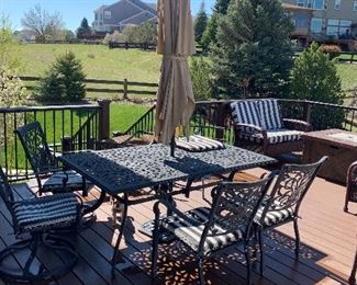 Outdoor set with six chairs and umbrella