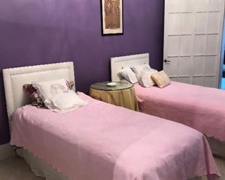 Twin bed:  headboards, frames, and mattresses, and side table