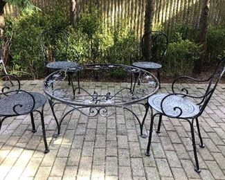 round metal coctail table - no glass - and four armchairs
