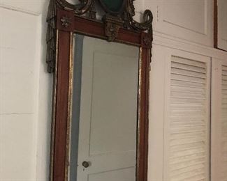 Framed mirror with metal detailing