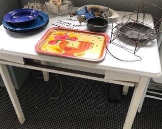 White enamel kitchen table, and enamel plates, metal  vintage platter, and metal decor
