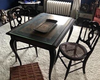 Game table with 2 chairs, marble-topped console table, lamps and baskets