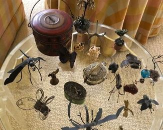 Metal "insect" collection and round acrylic scalloped-edge side table