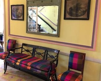 Italian 3-seat bench with silk cushions and side chairs with matching fabric, large mirror, vintage framed prints, and large area wool carpet