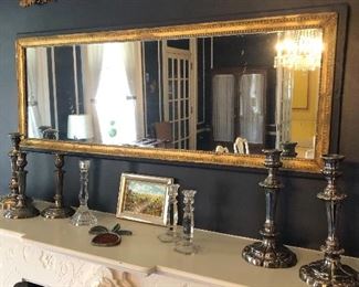 Gilded:  antique mirror and wall decor; candle holders:  sterling, crystal and silver-plate
