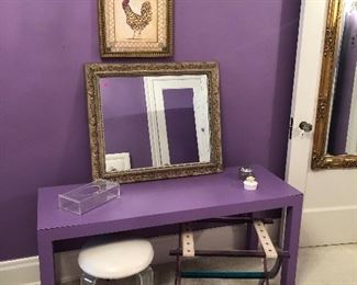 Acrylic vanity stool, luggage rack, mid-modern console table, acrylic tissue box, framed mirror
