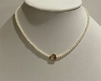 14k and Pearl necklace - 14 1/2 inches - price 100 dollars - comes with necklace holder 