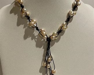 Pearl and leather necklace - 18 3/4 inches in length - price 50 dollars   