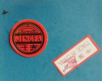 The original JINGFA paper label and the Made in China paper label on the bottom of the Fine Cloisonne Vases,
