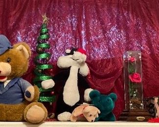 Assorted Stuffed Animals and Christmas Decor'