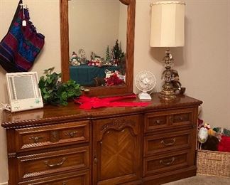 Dresser with Mirror, Woven Fabric Bag, Heavy Brass Lamp, Greenery