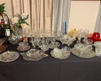 Assorted Crystal Pieces, Pink Depression Glassware, Grape Display with Empty Bottles of Wine in Wrought Iron Stand