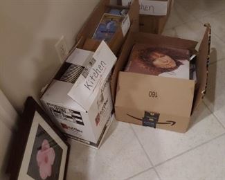 There will be boxes sealed and ready to move in the home.