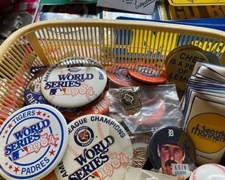 LOTS of vintage sports memorabilia--Tigers, Lions, Red Wings, Pistons, and more! Some signed items. Sports cards, souvenir cups, advertising items, old scorecards and programs, decals, bumper stickers, T-shirts, hats, buttons, pins, posters, keychains, patches, and much more.