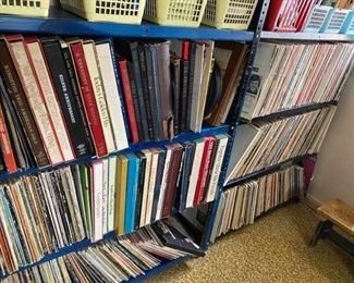 Hundreds, maybe over 1,000 vinyl records. Plus some 8-tracks, VHS, cassette tapes. Also several boxes of DVDs. These take up an entire room.