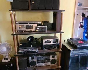 Tons of speakers and electronics (turntables, tape decks, amplifiers, 8-track players, boom boxes, and more) from the 1970s-1990s, including big names like Yamaha, Sony, Panasonic, and more