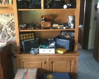Lionel Torpedo set on the top and tote on the left. The right tote is a 237w with box . Gilbert erector set too! This side also holds vintage cameras  and gear from Voigtlander, Kodak, Minolta, Argus, Beacon and more!