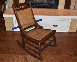 11. Antique Cane Rocking Chairs