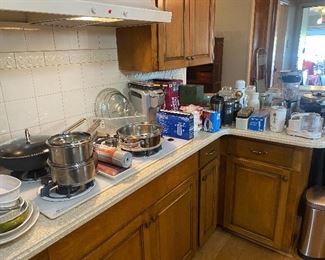 Pots & pans, baking dishes, waffle maker, antique ball jars & canisters, keurig coffee maker, choppers, mixers & blenders