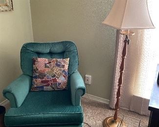 Emerald green swivel chair, floor lamp