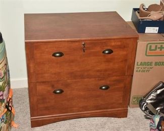 211. Wood Grain Two Drawer File Cabinet