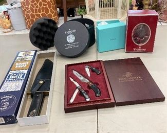 Brand new collectible Bowie knife and Winchester knives still in case