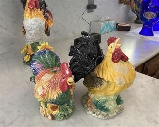 Three of many rooster/hen figures