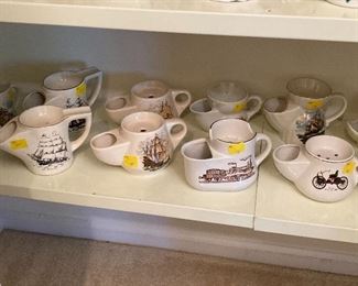 Scuttle mugs,some featuring horses, trains, sailboats