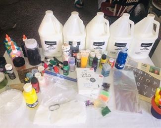 Acrylic paint, glitter, glow-in-the-dark glue, regular school glue, pain markers, stencils, plastic craft containers
