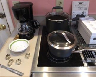 Pots & pans, cookie cutters, small coffee maker 