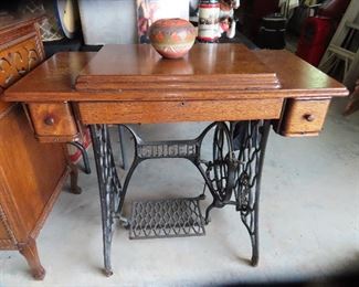 Antique Singer Sewing Machine in A Tiger Stripe Oak Cabinet