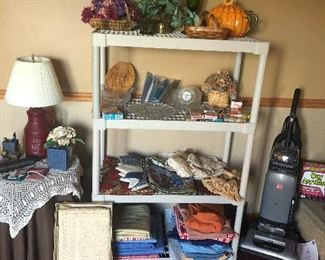Vacuum cleaner, Driggs lamp, side table, linens, glassware