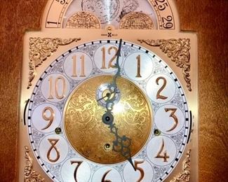 Howard Miller grandfather clock, close up view