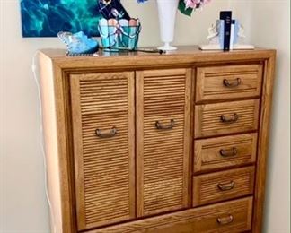 Chest of drawers, Artwork, stained glass bottle in basket, etc.