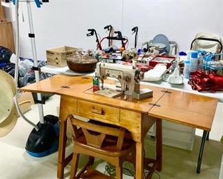 Sears Kenmore sewing machine in maple cabinet w/ chair