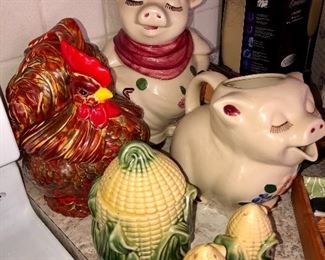 Shawnee "Smiley" pig pitcher and cookie jar, and Stanfordware Corn drippings jar, and S&P shakers