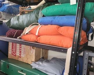 Vintage Coleman camping supplies, life jackets