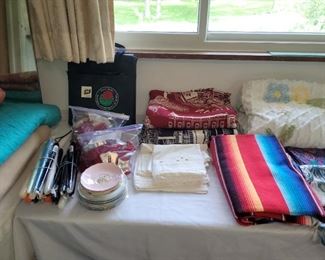 Linens, candles, chenille bedspread