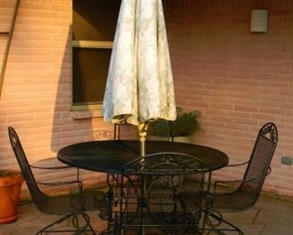 Rod-Iron Patio Table (48”x 30”) with 4 Swinging Chairs      with White And Blue Table Umbrella 