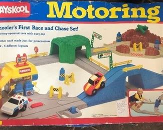 PLAYSKOOL “Motoring” A preschooler’s First Race and Chase Set! 1990 Vintage ,  Complete with all Track, including 2 & 3 Way Switch Track. Tunnel, Gas Station, Bridge and Danger Work Area,, 2 Cars, Caution Horses (3), Barrels (3), Road Signs (6), Racing Flags (4) and 1 Pipe/missing 2 and Guardrails