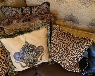 Pillows on corner couch. 