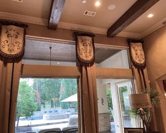 $500.  Set of 4 custom made window treatments.  About 20 feet long  each.  Hand painted design on top portion. Tan & brown color.  