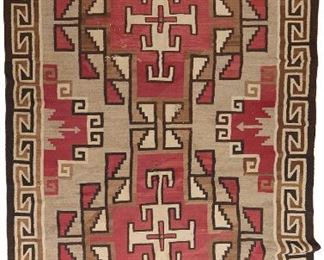 102
A Navajo Crystal Room-Sized Rug
Circa 1920
Woven in red, cream, dark brown, and brown with two large red diamonds with stepped and fretted elements and a hooked T border
127" L x 74" W
Estimate: $2,000 - $3,000
