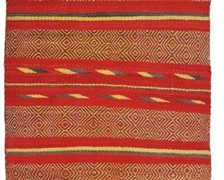 95
A Navajo Double Saddle Blanket
Fourth-quarter 19th Century
Banded motif in both diamond and diagonal twill weave, woven in red, grey, and yellow
54" L x 33" W
Estimate: $4,000 - $6,000