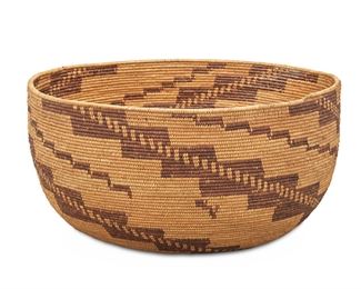 108
A Large Yokuts Basketry Bowl
First-quarter 20th Century
With radiating stepped spiral bands issuing from rim
7.5" H x 15.75" Dia.
Estimate: $2,000 - $3,000