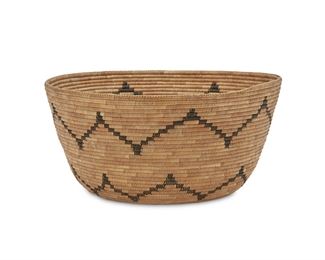 124
A California Mission/Soboba Basketry Bowl
First-quarter 20th Century
Woven with concentric eight-pointed flowers
5.5" H x 12" Dia.
Estimate: $600 - $800