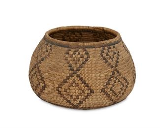 126
A California Mission Basketry Bowl
First-quarter 20th Century
Woven with seven columns of concentric, conjoined diamonds
4.5" H x 7" W
Estimate: $600 - $800