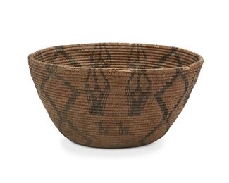 129
An Apache Pictorial Basketry Bowl
First-quarter 20th Century
With dog motif and four conjoined diamond columns
6.5" H x 13" Dia.
Estimate: $300 - $500